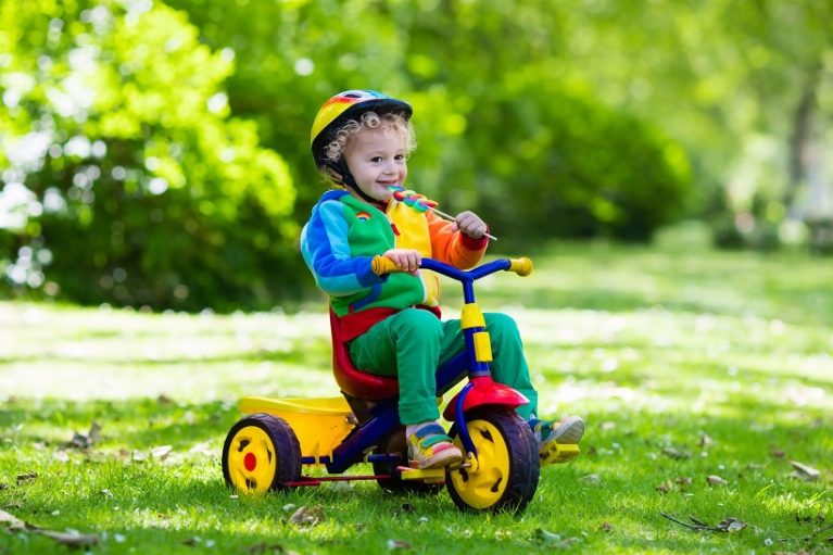 learning how to ride a tricycle